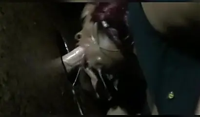 Nasty ebony slut blows a white dick through a gloryhole