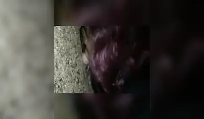 Nasty ebony slut blows a white dick through a gloryhole