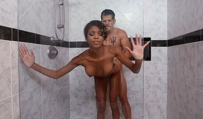 Busty ebony Nia Nacci gets fucked by her stepbro in the shower