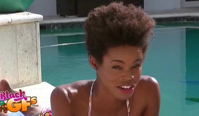 Ebony model Mila Dulce strips poolside and gives a BJ