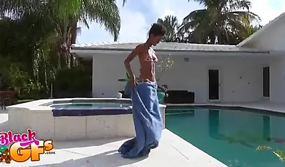 Ebony model Mila Dulce strips poolside and gives a BJ