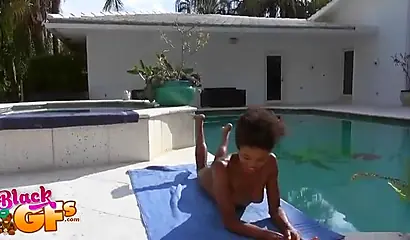 Ebony model Mila Dulce strips poolside and gives a BJ