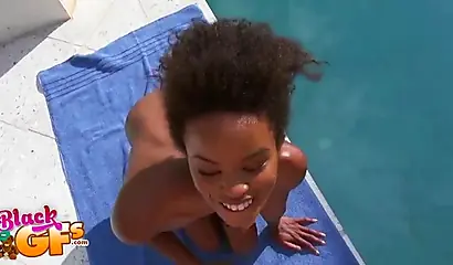 Ebony model Mila Dulce strips poolside and gives a BJ
