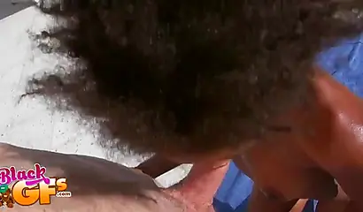 Ebony model Mila Dulce strips poolside and gives a BJ