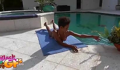 Ebony model Mila Dulce strips poolside and gives a BJ