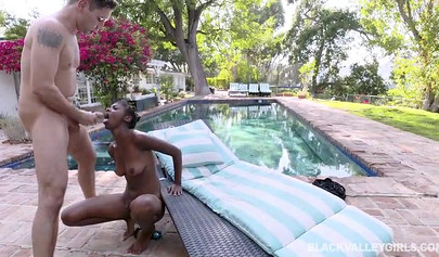 Ebony Daizy Cooper gets facialed after riding a white dick