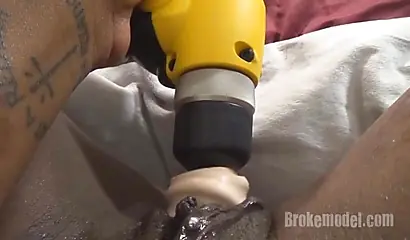 Monique uses a drill sex toy to pleasure her pussy