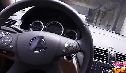 Amazing black babe Noemie Bilas gives a blowjob in a car