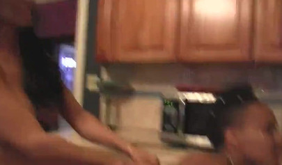 Isis Love puts on a strapon and fucks her slave