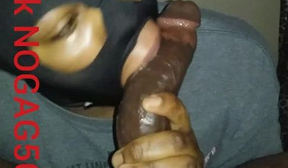 Masked amateur wraps her lips around a big black cock