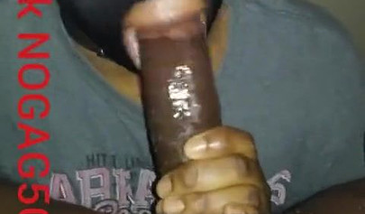 Masked amateur wraps her lips around a big black cock