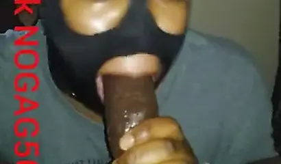 Masked amateur wraps her lips around a big black cock