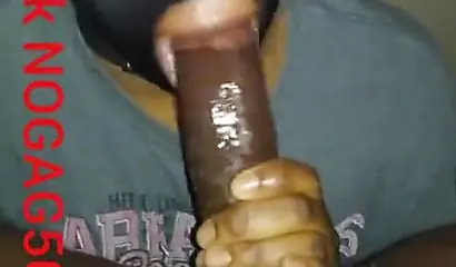 Masked amateur wraps her lips around a big black cock