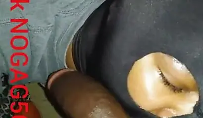 Masked amateur wraps her lips around a big black cock