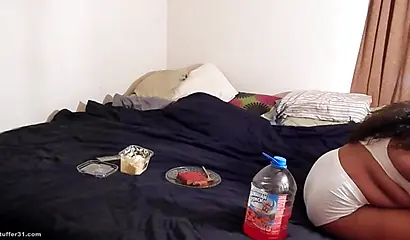 Fat amateur chicks in white lingerie eats some food on camera