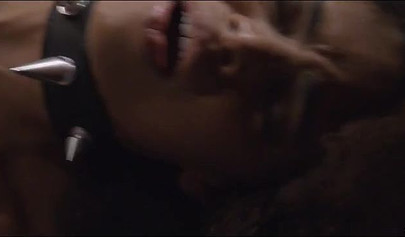 Luna Corazon is bound while shafted by a stiff pole