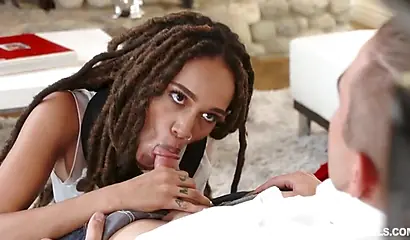 Stunning Julie Kay sucks him off and rides his cock on the couch