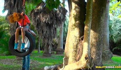 Desirable black chick Kendall Woods gives a blowjob outdoors