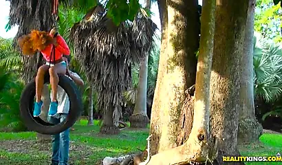 Desirable black chick Kendall Woods gives a blowjob outdoors