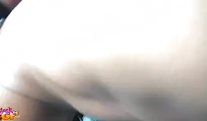 Tiny Ebony gives a blowjob to her man while in the car