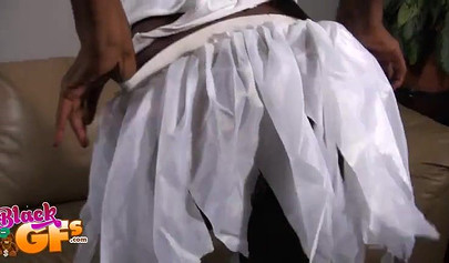 Black chick dressed like an angel takes care of his boner