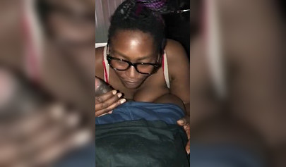 Jizz hungry amateur black babe with glasses sucks a BBC