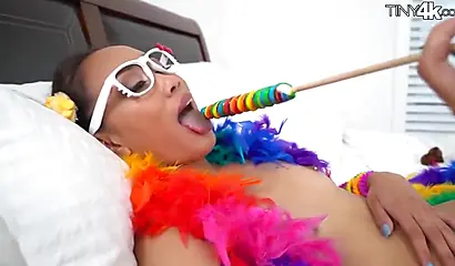 Naughty schoolgirl Aria Skye plays around with a lollipop before her man arrives