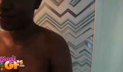 Irresistible black babe munches on a rock-solid black pecker like a pro