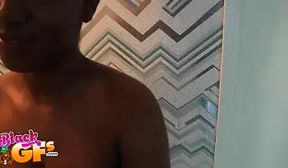 Irresistible black babe munches on a rock-solid black pecker like a pro