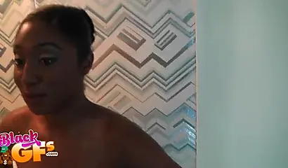 Irresistible black babe munches on a rock-solid black pecker like a pro