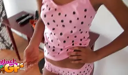 Desirable ebony chick teases with her pretty body in the kitchen