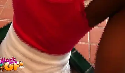 Desirable ebony chick teases with her pretty body in the kitchen