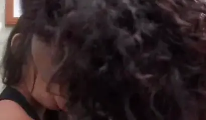 Astonishing brunette beauties kiss while caressing each other's stunning bodies