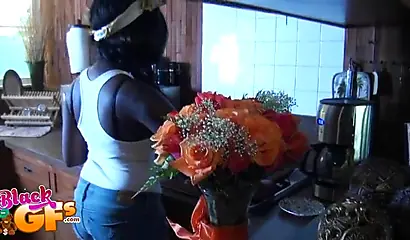 Black babe takes off her clothes and shows her curves