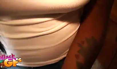 Black babe takes off her clothes and shows her curves