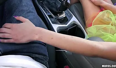 Maya Bijou shows off her titties in the car for the camera