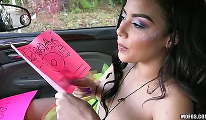 Maya Bijou shows off her titties in the car for the camera