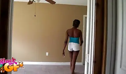 Mesmerizing black babe gets down on her knees to suck dick