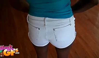 Mesmerizing black babe gets down on her knees to suck dick