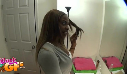 Lusty ebony shows her tits before they exchange oral pleasures