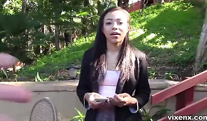 Black girl gets on her knees and then sucks on a big white dick while moaning