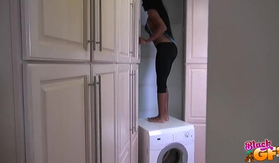 Hot MILF ebony cutie gives a great blowjob in the laundry room and loves it