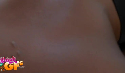 Young ebony babe with big tits sucks a white dick and gets fingered nicely