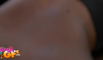 Pretty dark ebony chick sucks a fat white prick and gets a finger in her asshole