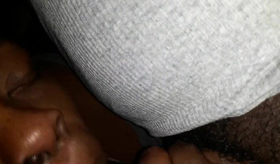 Ugly ebony MILF giving some great head late at night and loving the feeling