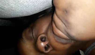 Ugly ebony MILF giving some great head late at night and loving the feeling