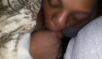 Ugly ebony MILF giving some great head late at night and loving the feeling