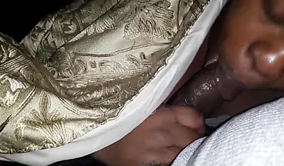 Ugly ebony MILF giving some great head late at night and loving the feeling