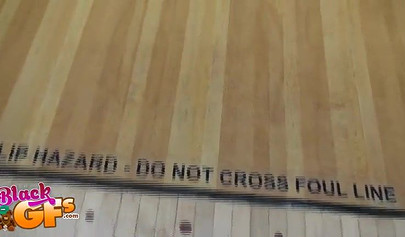 Ebony babe goes bowling and is seduced by a white dude to show and flash her tits