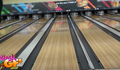 Ebony babe goes bowling and is seduced by a white dude to show and flash her tits